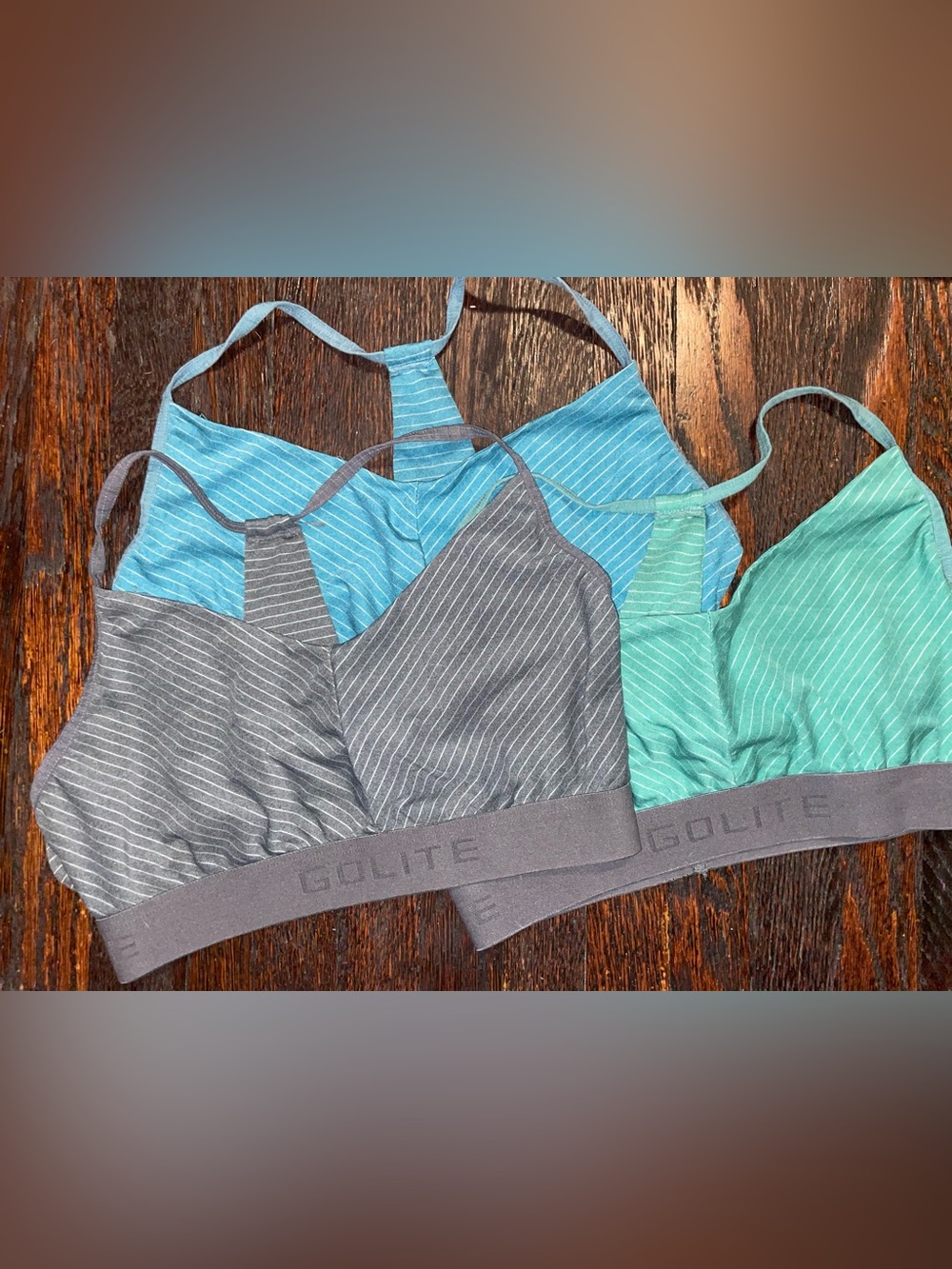 Set of 3 striped eco-friendly Go Lite sports bras blue green gray